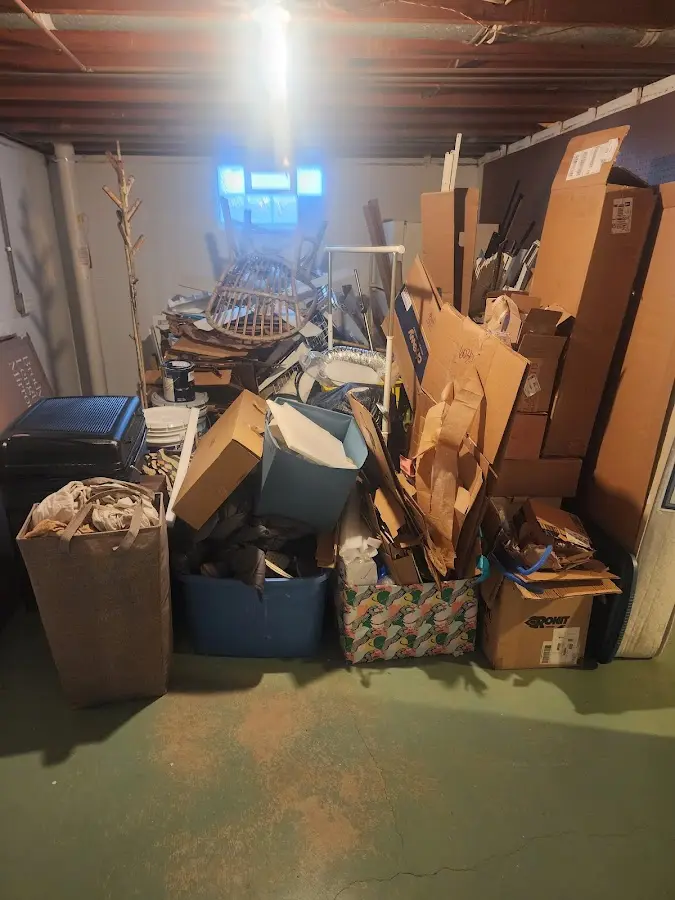 Roll-off dumpster container at job site for 6 Yard Dumpster Rental in Bostonia